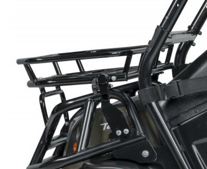 A close-up of a black metal storage rack attached to the frame of an off-road utility vehicle.