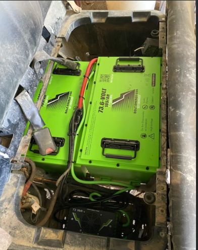 Two Bolt Energy USA 73.6-volt 105Ah lithium batteries installed in an electric vehicle with a 72-volt charger.