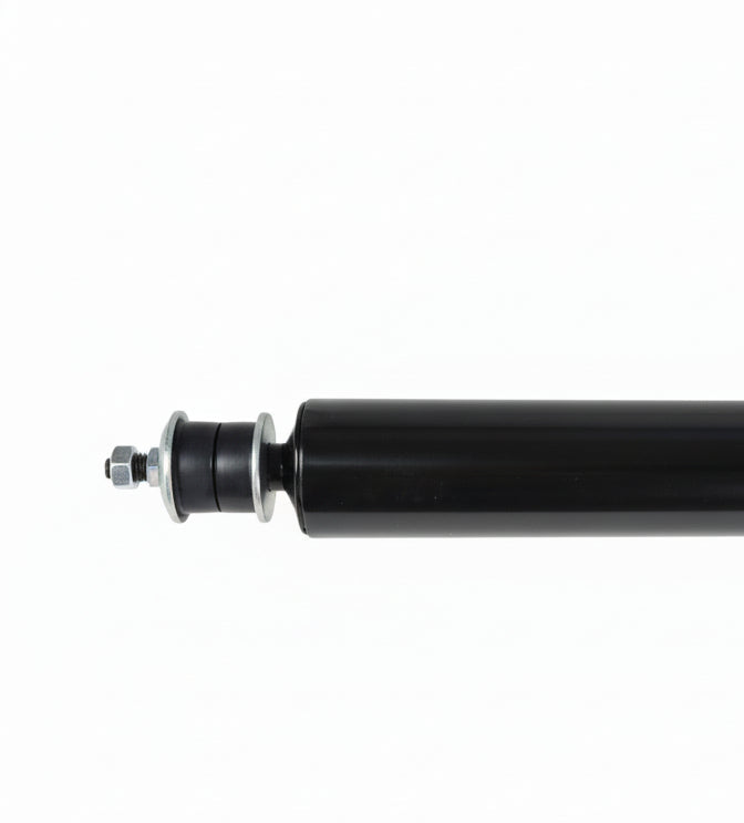 Displays a section of a black shock absorber, featuring its mounting bolt, washers, and rubber bushing.